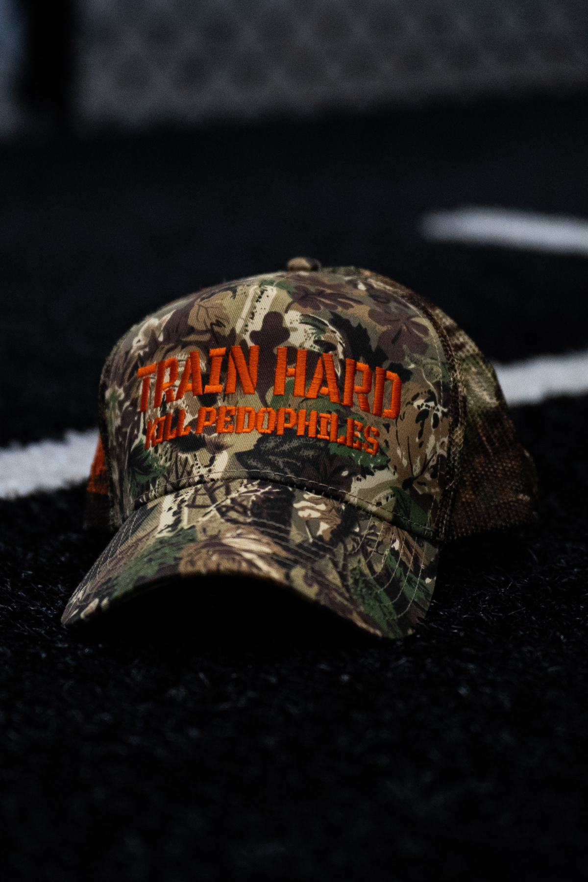 Train Hard Camouflage Trucker Hat